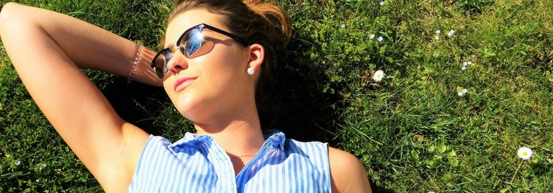 woman lying in the sun for vitamin d and allergies