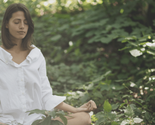 woman implementing stress management techniques for allergy relief